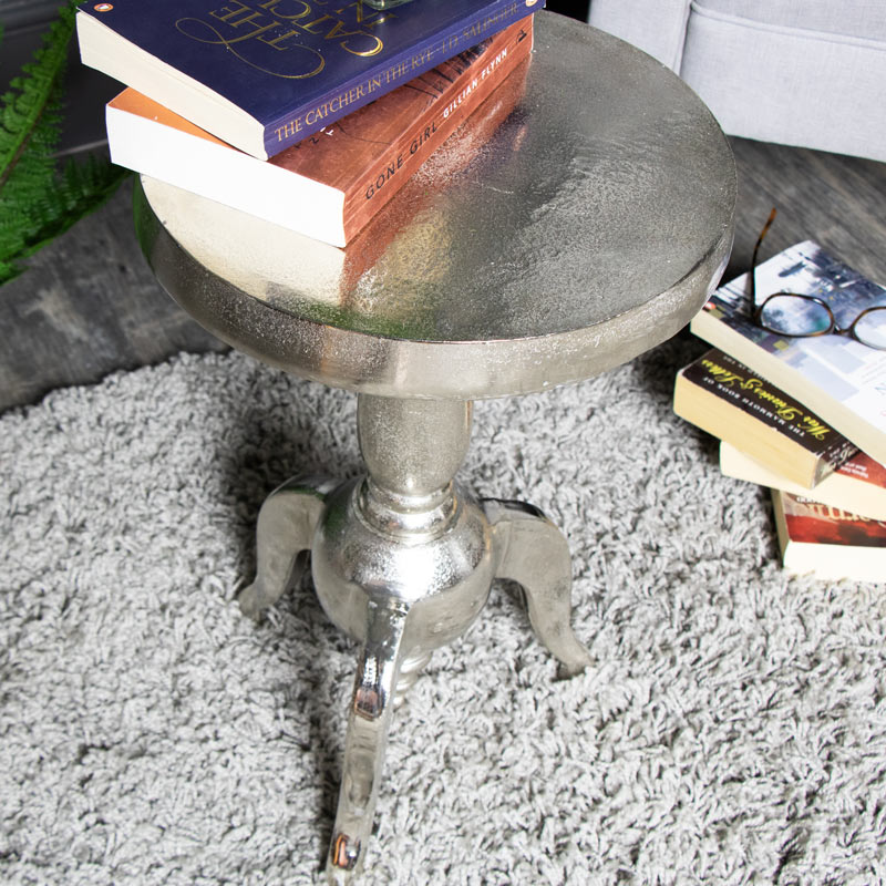 Small round store silver side table