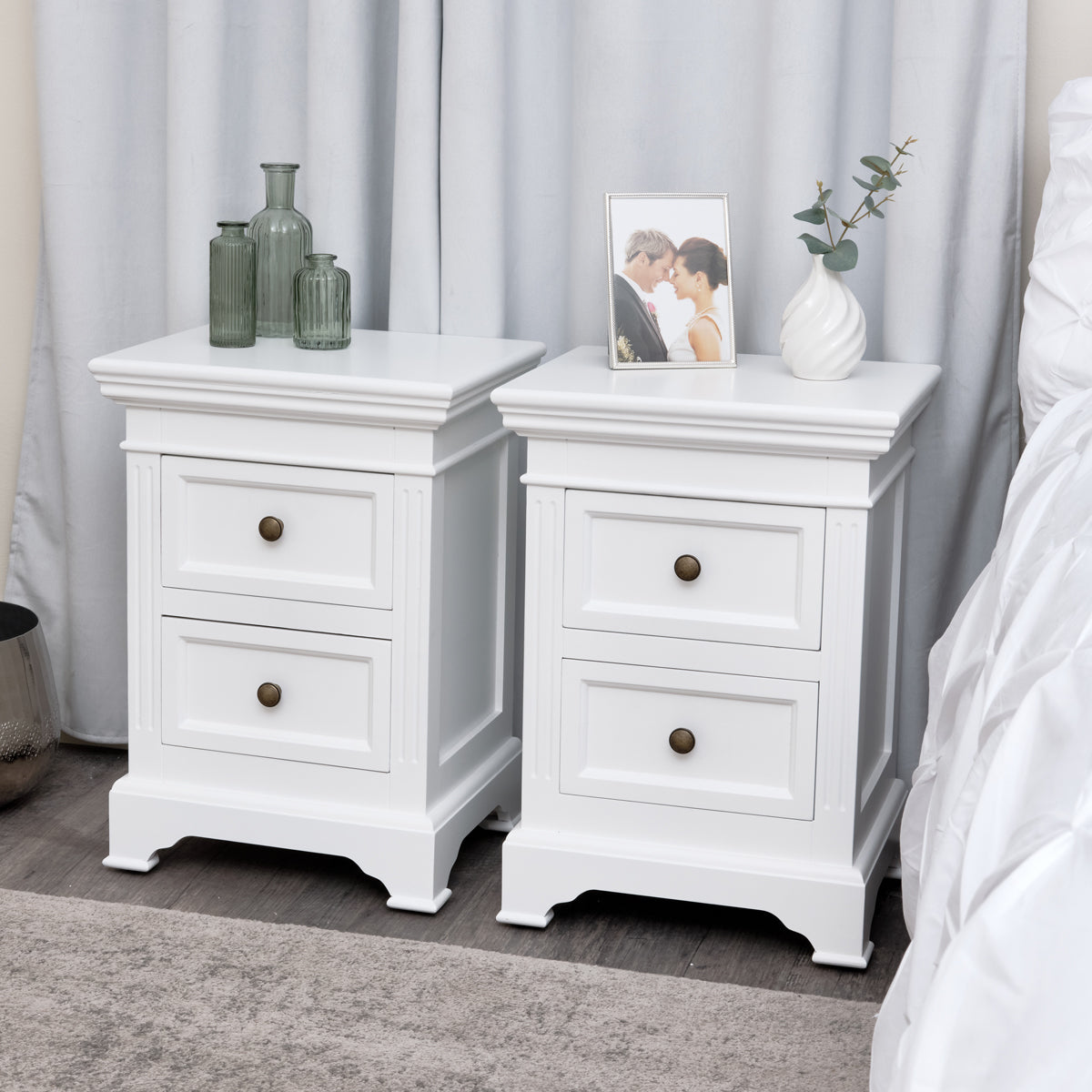 White two drawer bedside outlet table